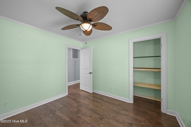 5137 Carr, Grifton, NC 28530 - unfurnished bedroom featuring ornamental molding, dark wood-type flooring, a closet, baseboards, and ceiling fan