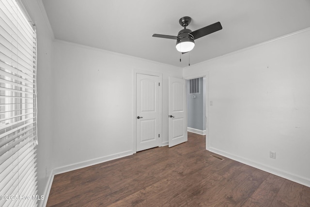 5137 Carr, Grifton, NC 28530 - unfurnished bedroom with dark wood-style flooring, crown molding, baseboards, and a ceiling fan