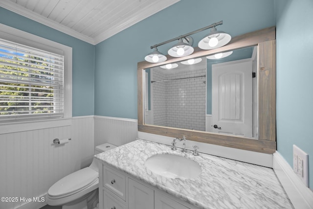 5137 Carr, Grifton, NC 28530 - full bathroom featuring vanity, a shower, a wainscoted wall, toilet, and ornamental molding