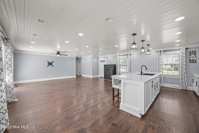 5137 Carr, Grifton, NC 28530 - kitchen with a sink, recessed lighting, open floor plan, ornamental molding, and baseboards