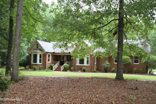 1317 Worthington Ln, Greenville, NC 27858 - ranch-style house featuring brick siding and a front lawn