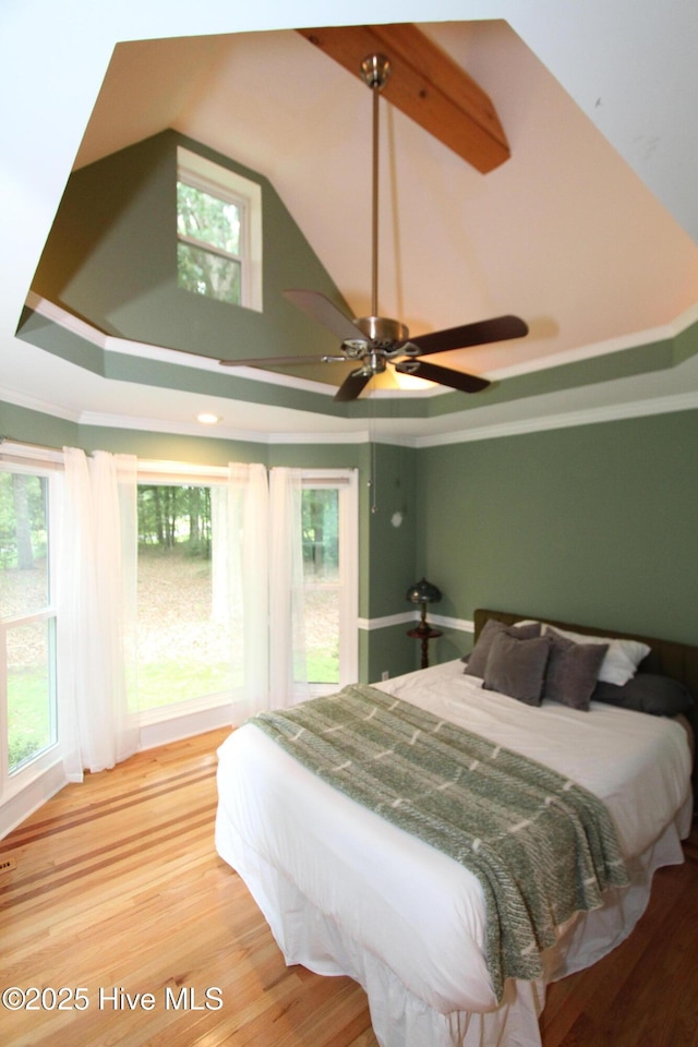 1317 Worthington Ln, Greenville, NC 27858 - bedroom featuring light wood-style flooring, ornamental molding, high vaulted ceiling, and a ceiling fan
