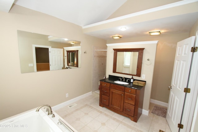 1317 Worthington Ln, Greenville, NC 27858 - full bath featuring vanity, tile patterned floors, lofted ceiling, a tile shower, and a tub