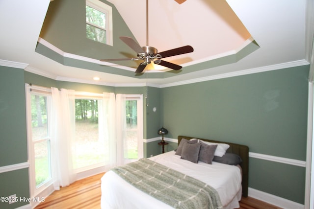 1317 Worthington Ln, Greenville, NC 27858 - bedroom featuring light wood-style flooring, ceiling fan, recessed lighting, and a tray ceiling