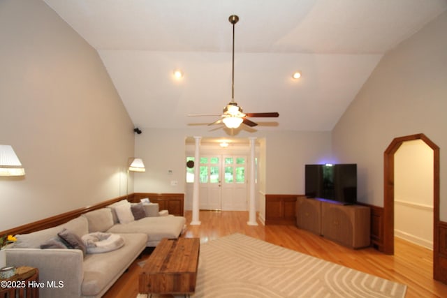 1317 Worthington Ln, Greenville, NC 27858 - living room with light wood finished floors, wainscoting, a ceiling fan, lofted ceiling, and arched walkways