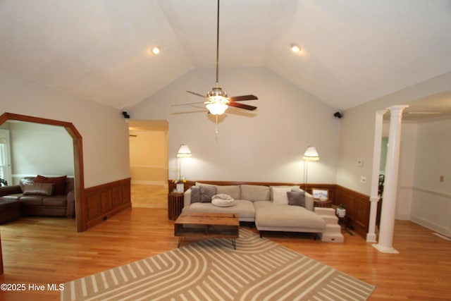 1317 Worthington Ln, Greenville, NC 27858 - living area with a wainscoted wall, light wood finished floors, a ceiling fan, lofted ceiling, and decorative columns