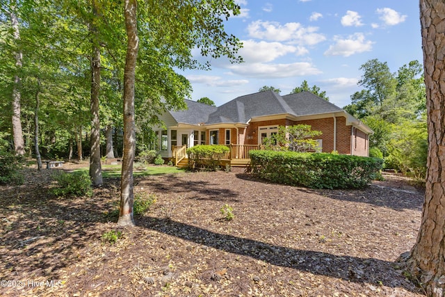 8807 Sawmill Creek Ln, Wilmington, NC 28411 - view of front of property with brick siding and roof with shingles