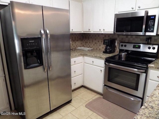 222 Rivershore Dr, New Bern, NC 28560 - kitchen featuring stainless steel appliances, white cabinetry, backsplash, and light tile patterned floors