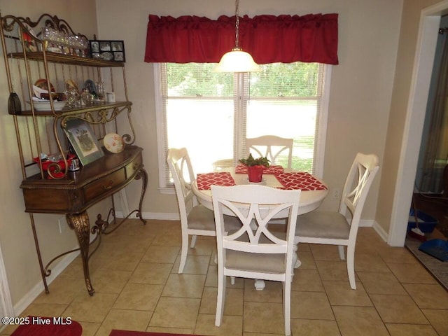 222 Rivershore Dr, New Bern, NC 28560 - dining room with light tile patterned flooring and baseboards