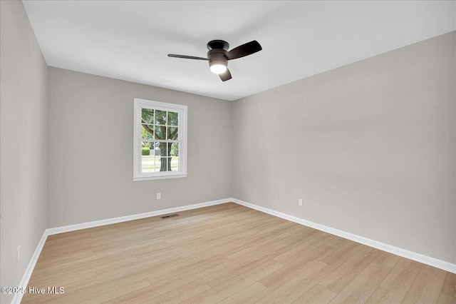 3417 Chalmers Dr, Wilmington, NC 28409 - spare room featuring a ceiling fan, light wood-style flooring, and baseboards