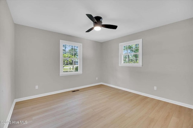 3417 Chalmers Dr, Wilmington, NC 28409 - unfurnished room with plenty of natural light, wood finished floors, and baseboards