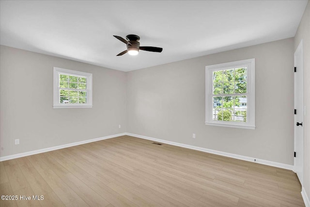 3417 Chalmers Dr, Wilmington, NC 28409 - spare room with a ceiling fan, light wood-style floors, and baseboards