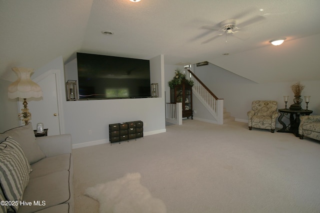 141 N River Rd, Plymouth, NC 27962 - carpeted living room featuring stairway, ceiling fan, lofted ceiling, and baseboards