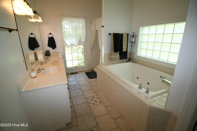 141 N River Rd, Plymouth, NC 27962 - full bathroom with a tub with jets and double vanity