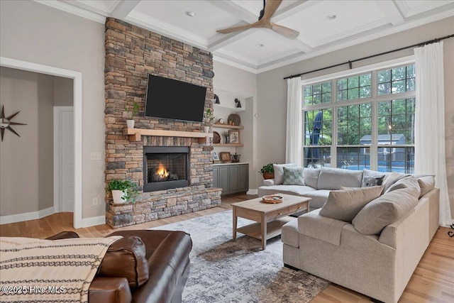 42 Spearhead Dr, Whispering Pines, NC 28327 - living area with a ceiling fan, coffered ceiling, wood finished floors, crown molding, and a fireplace