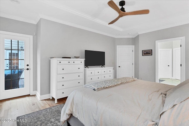 42 Spearhead Dr, Whispering Pines, NC 28327 - bedroom with wood finished floors, crown molding, baseboards, a ceiling fan, and access to outside