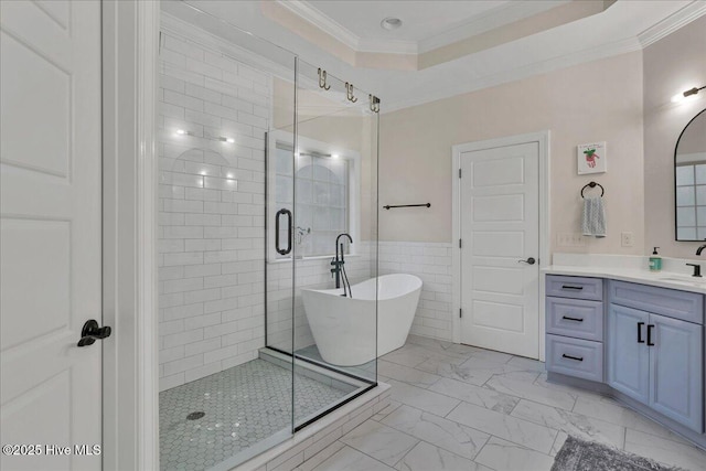 42 Spearhead Dr, Whispering Pines, NC 28327 - full bathroom with marble look tile flooring, a freestanding tub, vanity, crown molding, and a stall shower