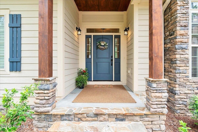 42 Spearhead Dr, Whispering Pines, NC 28327 - view of exterior entry with stone siding