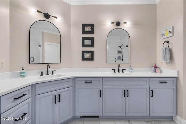 42 Spearhead Dr, Whispering Pines, NC 28327 - full bathroom with double vanity, ornamental molding, and tiled shower