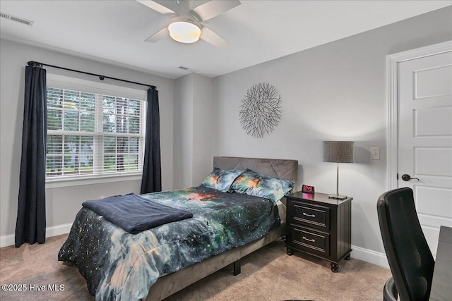 42 Spearhead Dr, Whispering Pines, NC 28327 - bedroom with light carpet, baseboards, and ceiling fan