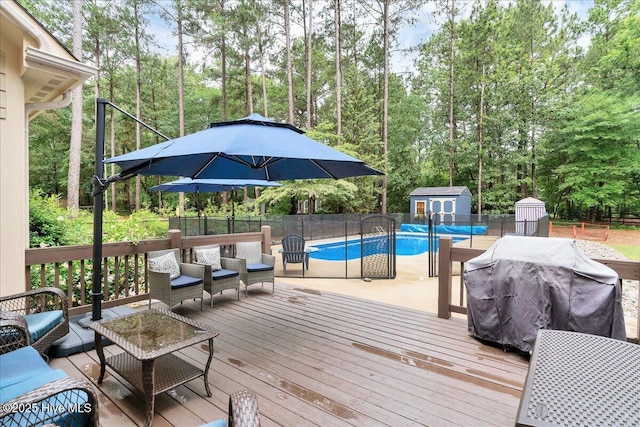 42 Spearhead Dr, Whispering Pines, NC 28327 - wooden terrace with outdoor lounge area, a fenced backyard, and view of wooded area