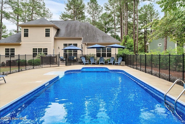 42 Spearhead Dr, Whispering Pines, NC 28327 - view of pool featuring a patio area