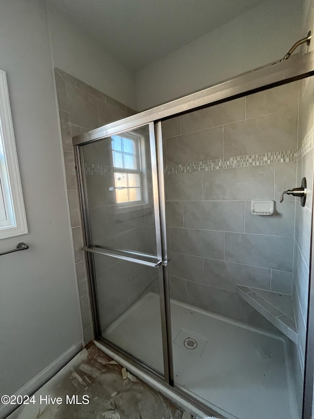2958 Old Berwick St SW, Shallotte, NC 28470 - full bathroom featuring a stall shower and baseboards