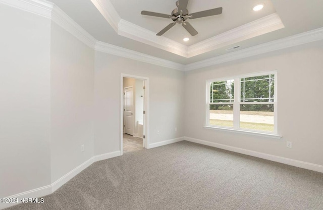 2958 Old Berwick St SW, Shallotte, NC 28470 - carpeted spare room featuring crown molding, a tray ceiling, a ceiling fan, baseboards, and recessed lighting