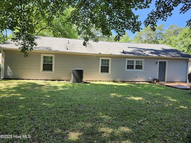 1108 Plymouth Dr, New Bern, NC 28562 - rear view of property with cooling unit and a yard