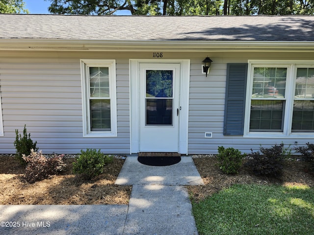 1108 Plymouth Dr, New Bern, NC 28562 - entrance to property featuring a shingled roof