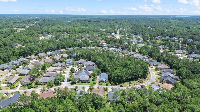 770 Creekway Cir SE, Bolivia, NC 28422 - view of property location with a heavily wooded area and nearby suburban area