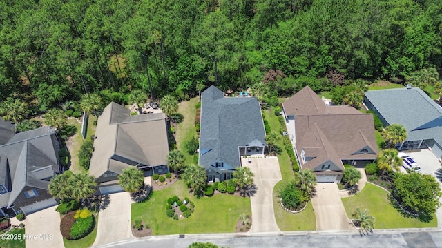 770 Creekway Cir SE, Bolivia, NC 28422 - aerial perspective of suburban area with a forest