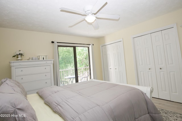 940 Linden Rd Unit 19, Pinehurst, NC 28374 - bedroom featuring light wood finished floors, two closets, a ceiling fan, and access to outside