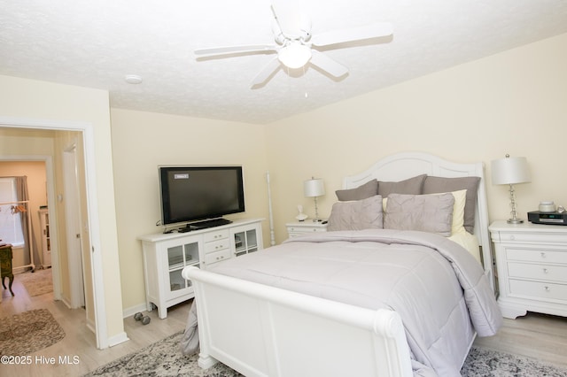 940 Linden Rd Unit 19, Pinehurst, NC 28374 - bedroom featuring light wood-style flooring and a ceiling fan
