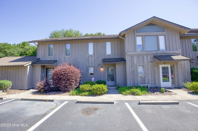 940 Linden Rd Unit 19, Pinehurst, NC 28374 - multi unit property featuring uncovered parking and a shingled roof