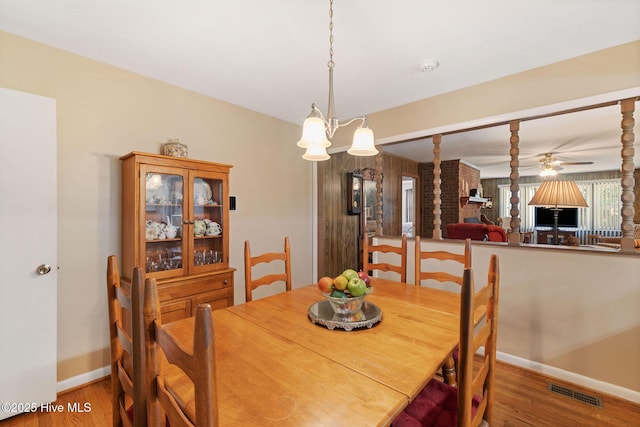 1606 Palm St, Goldsboro, NC 27530 - dining space featuring wood finished floors, baseboards, and a ceiling fan
