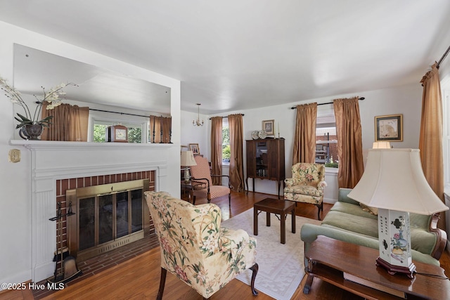 1606 Palm St, Goldsboro, NC 27530 - living area with wood finished floors and a fireplace