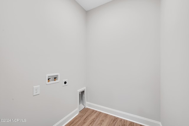 2133 Kali Ln Unit B, Greenville, NC 27834 - laundry area with hookup for an electric dryer, washer hookup, baseboards, and light wood-style flooring