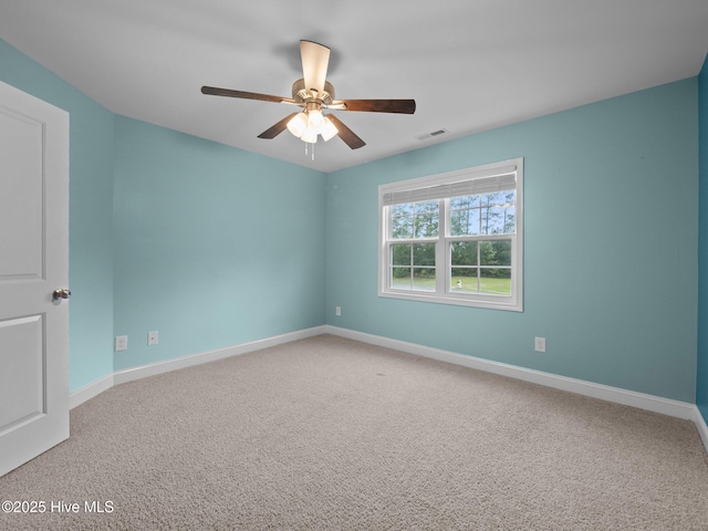 608 Creek Ct, Swansboro, NC 28584 - carpeted spare room with a ceiling fan and baseboards