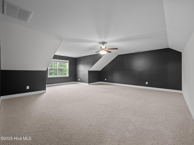 608 Creek Ct, Swansboro, NC 28584 - bonus room featuring vaulted ceiling, a ceiling fan, baseboards, and carpet flooring