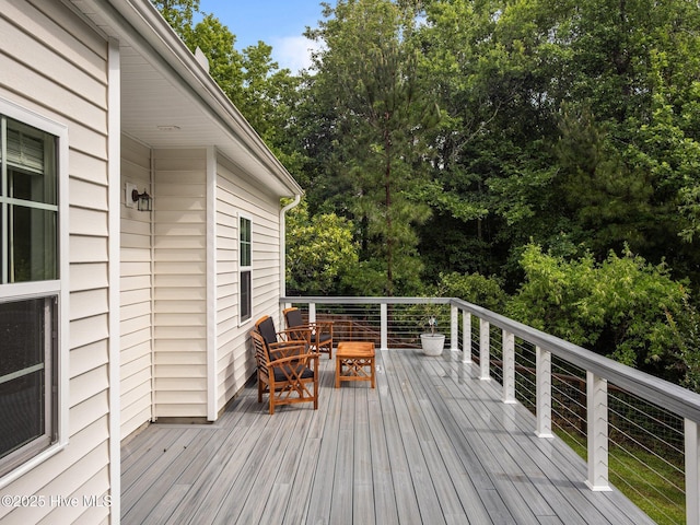 608 Creek Ct, Swansboro, NC 28584 - deck featuring view of scattered trees