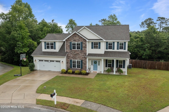 608 Creek Ct, Swansboro, NC 28584 - view of front facade featuring stone siding, driveway, central AC unit, roof with shingles, and covered porch