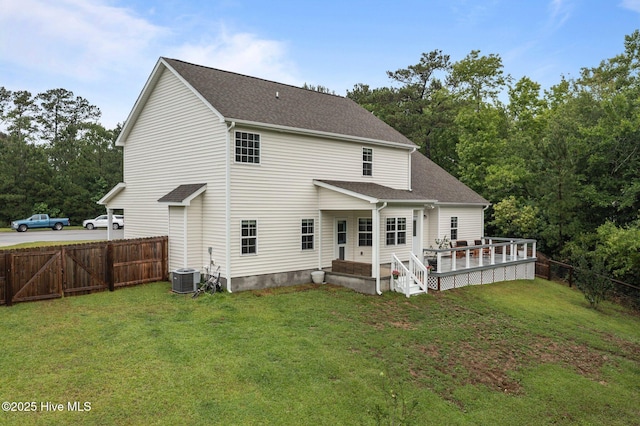608 Creek Ct, Swansboro, NC 28584 - rear view of house with a shingled roof and a wooden deck