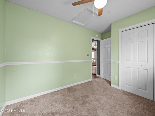 329 Buckhead Rd, Hubert, NC 28539 - unfurnished bedroom featuring carpet, a closet, baseboards, a ceiling fan, and attic access
