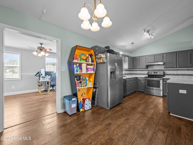 329 Buckhead Rd, Hubert, NC 28539 - kitchen featuring appliances with stainless steel finishes, under cabinet range hood, vaulted ceiling, dark wood finished floors, and backsplash