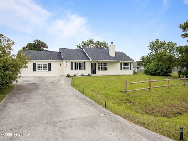 329 Buckhead Rd, Hubert, NC 28539 - single story home featuring concrete driveway and a chimney