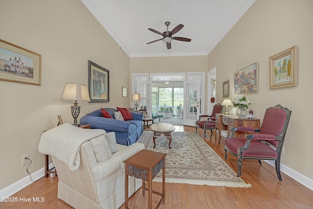 3856 Harmony Cir, Southport, NC 28461 - living area featuring ceiling fan, baseboards, ornamental molding, and wood finished floors