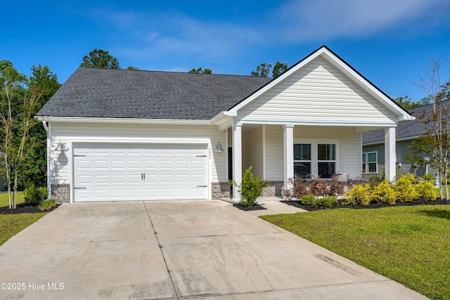 6437 Twinspur Ct SW, Ocean Isle Beach, NC 28469 - view of front of house with driveway, a front lawn, an attached garage, covered porch, and roof with shingles