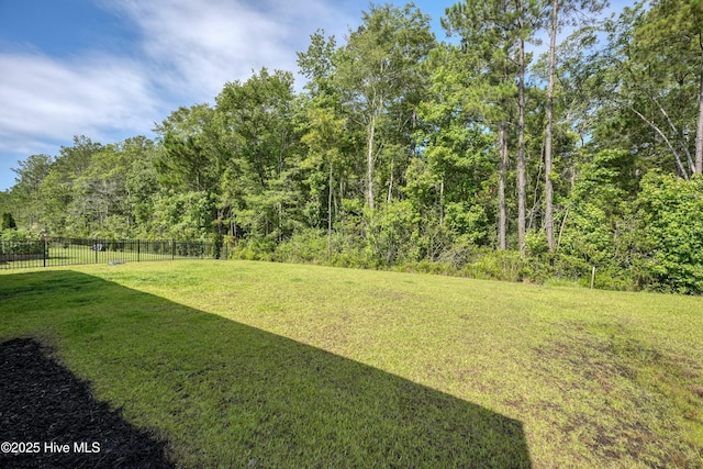 6437 Twinspur Ct SW, Ocean Isle Beach, NC 28469 - view of yard featuring a view of trees