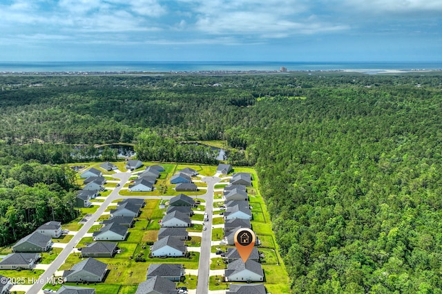 6437 Twinspur Ct SW, Ocean Isle Beach, NC 28469 - aerial view of residential area with a heavily wooded area and a large body of water